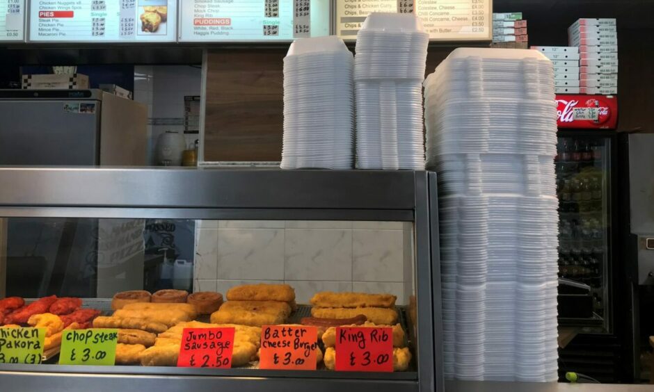 Single use containers stacked up in a takeaway shop in Aberdeen