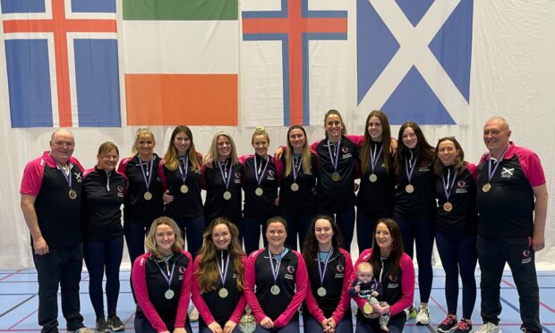 Shona Fraser, centre of back row, was part of the Scotland Women's volleyball team who won the Small Countries Association Indoor Championship for the first time. Photo by Stephen Kennedy/Scotland Volleyball.