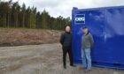David Hunter of OEG Offshore with Peter Stock, chairman of the Bailies of Bennachie, outside the donated container.