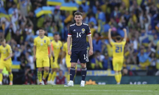 Billy Gilmour cuts a dejected figure after Scotland go 2-0 down to Ukraine.