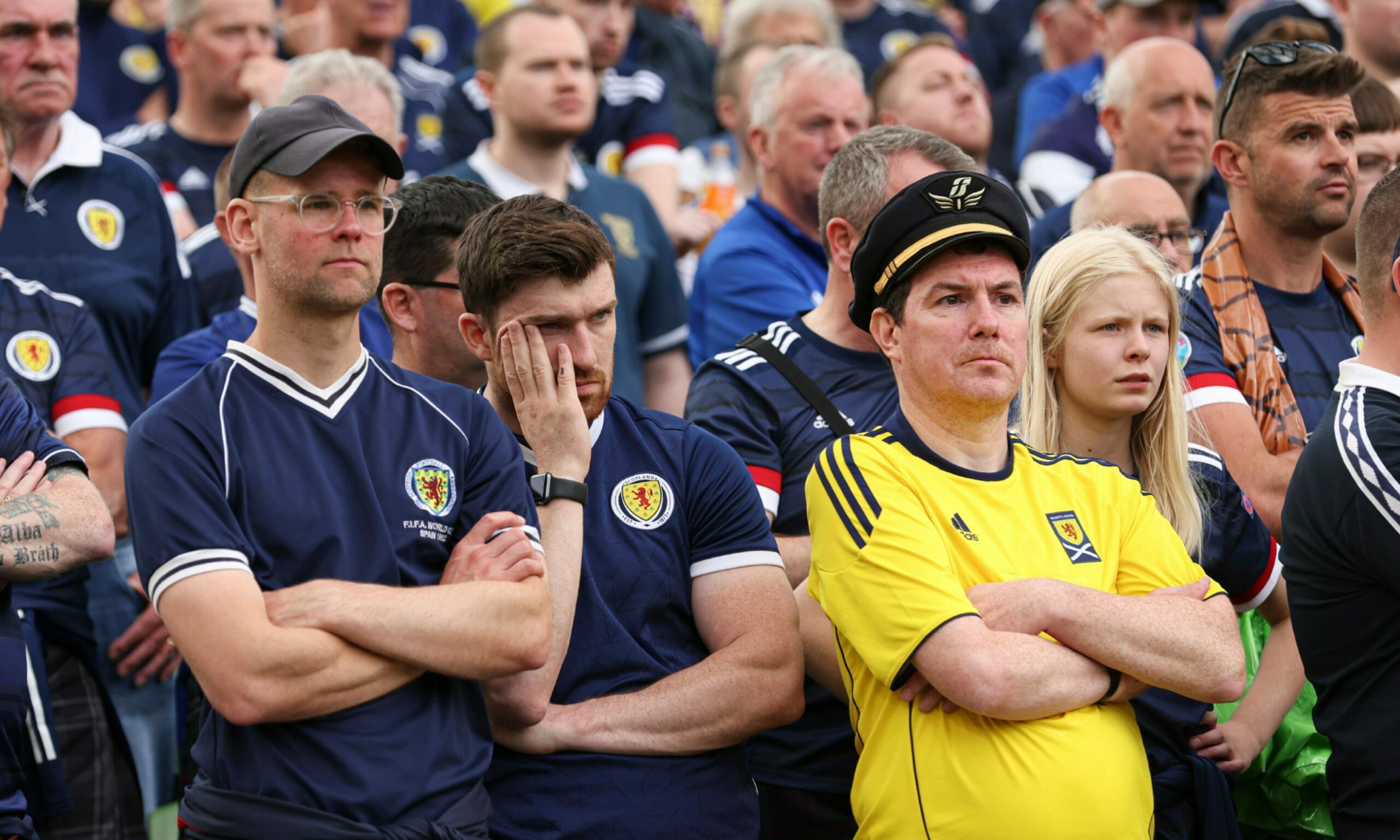 Scotland football fans look dejected after defeat in Dublin