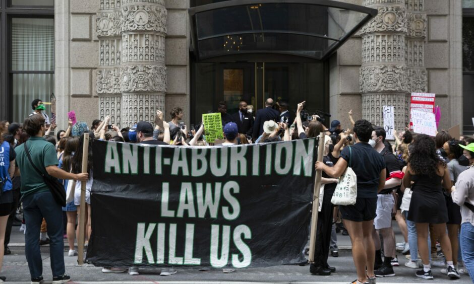 Abortion rights advocates picket outside of The University Club where The Federalist Society was hosting an event. The organisation has supported the overturn of Roe v. Wade. Photo by Gina M Randazzo/ZUMA Press Wire/Shutterstock (13012056af)