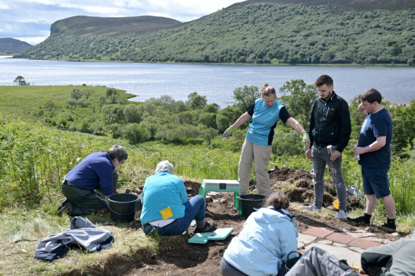 Volunteers at the Clyne Heritage Society's excavation of the pre-clearance building at Grianan.
