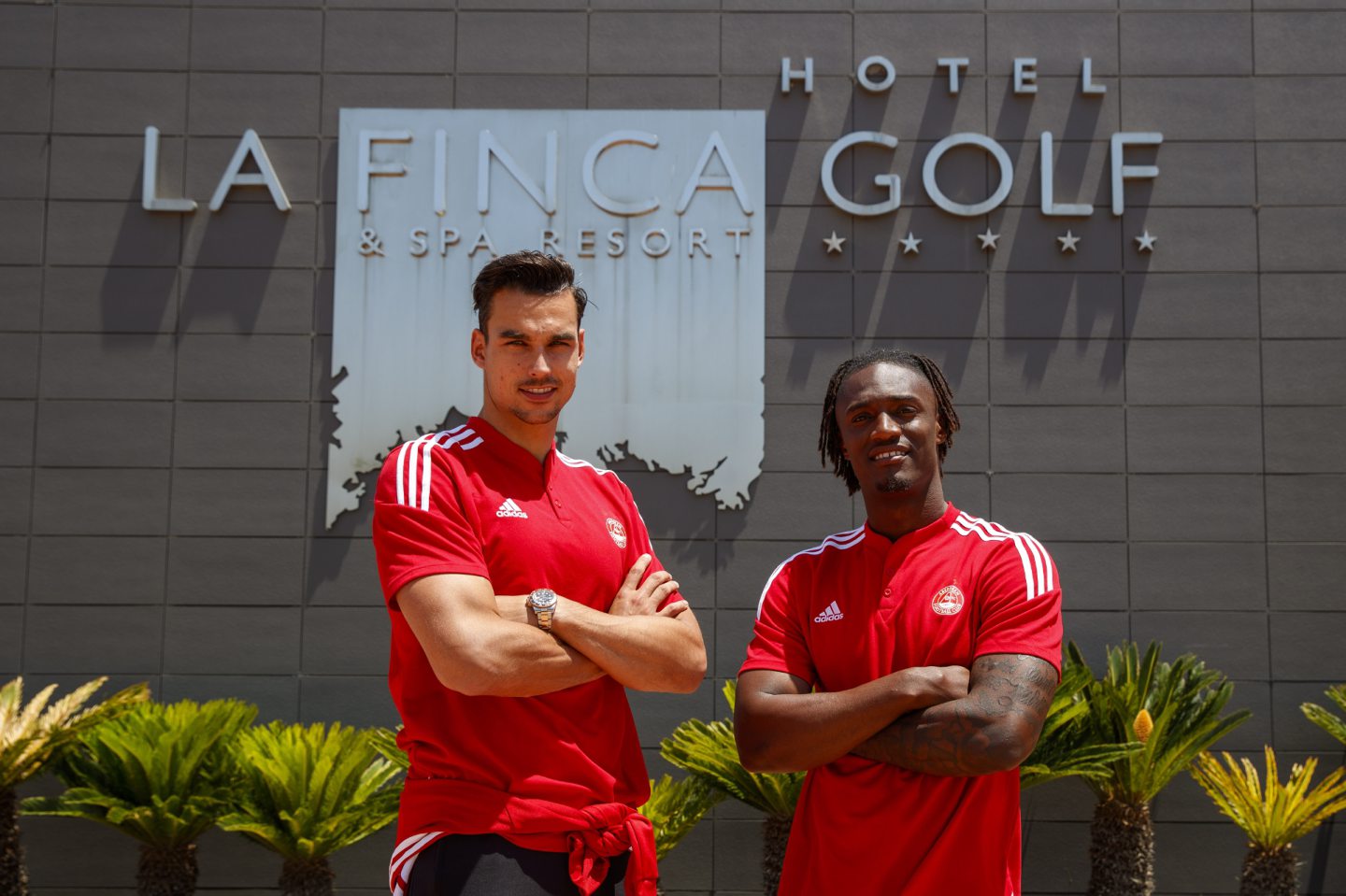 New Signings arrive Kelle Roos and Anthony Stewart at the Dons' Spanish base.