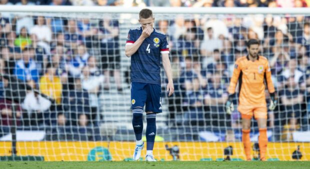 Scotland's Scott McTominay looks dejected during the game