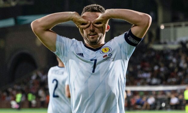 Scotland's John McGinn celebrates making it 3-1 against Armenia