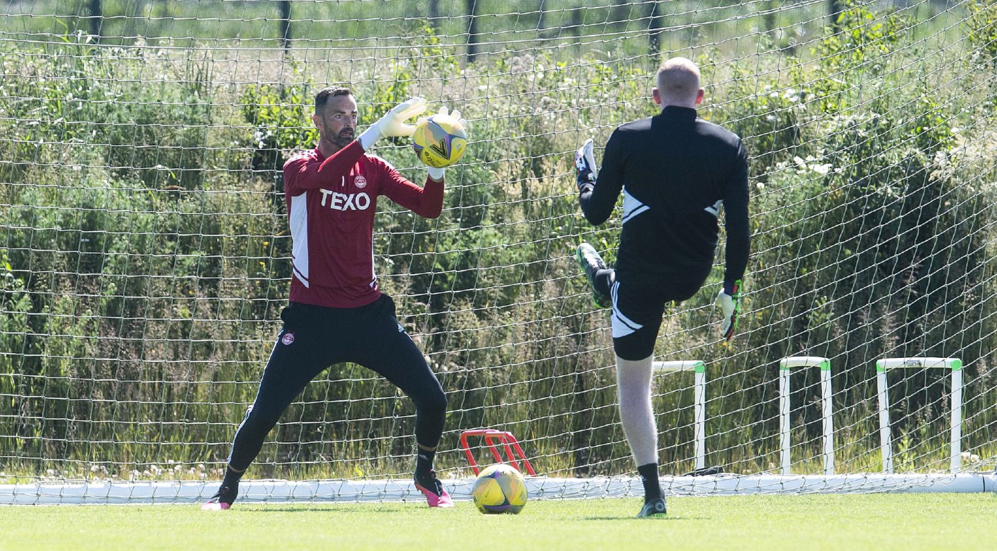 Keeper Joe Lewis is put through his paces during a training session.