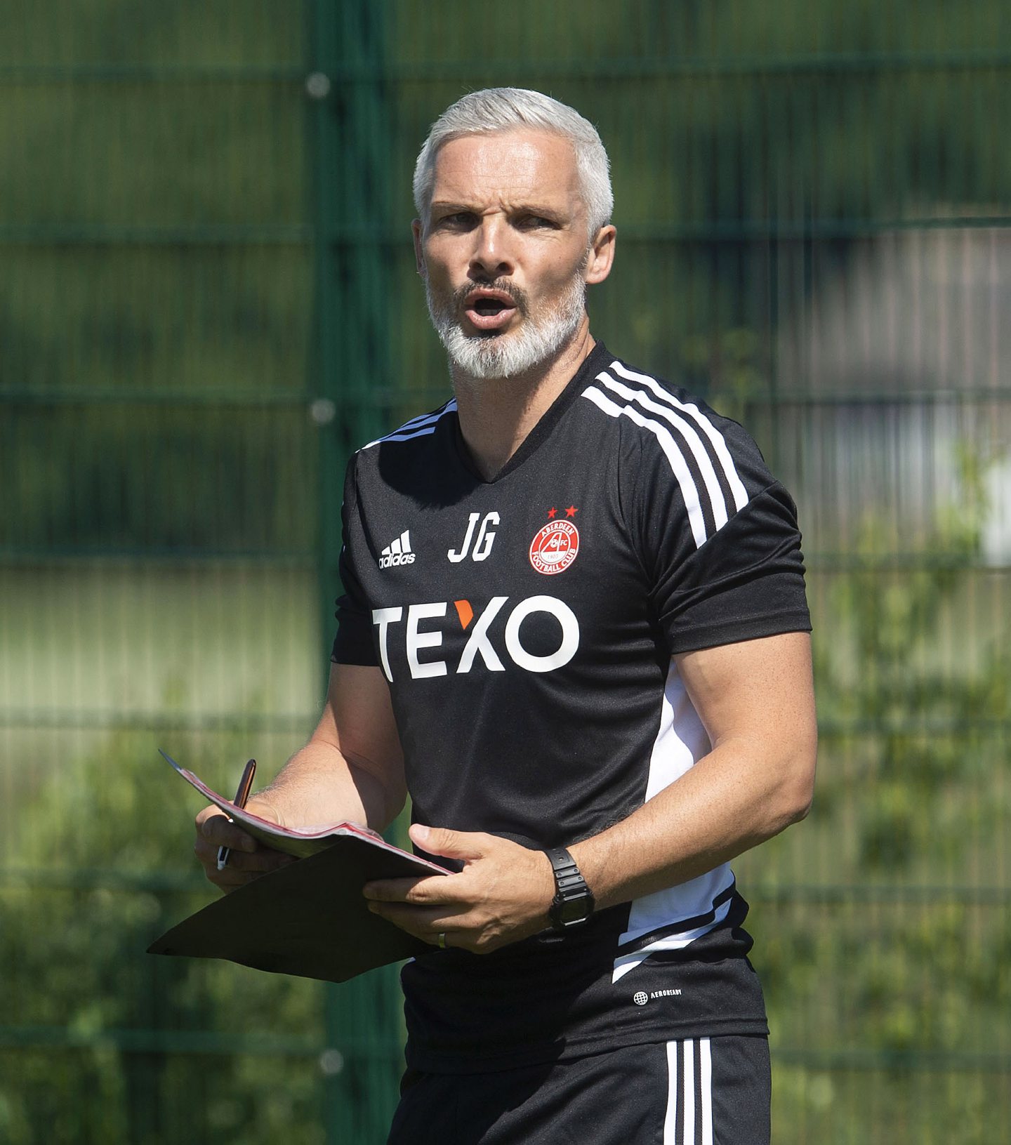 Aberdeen boss Jim Goodwin training the squad at Cormack Park.