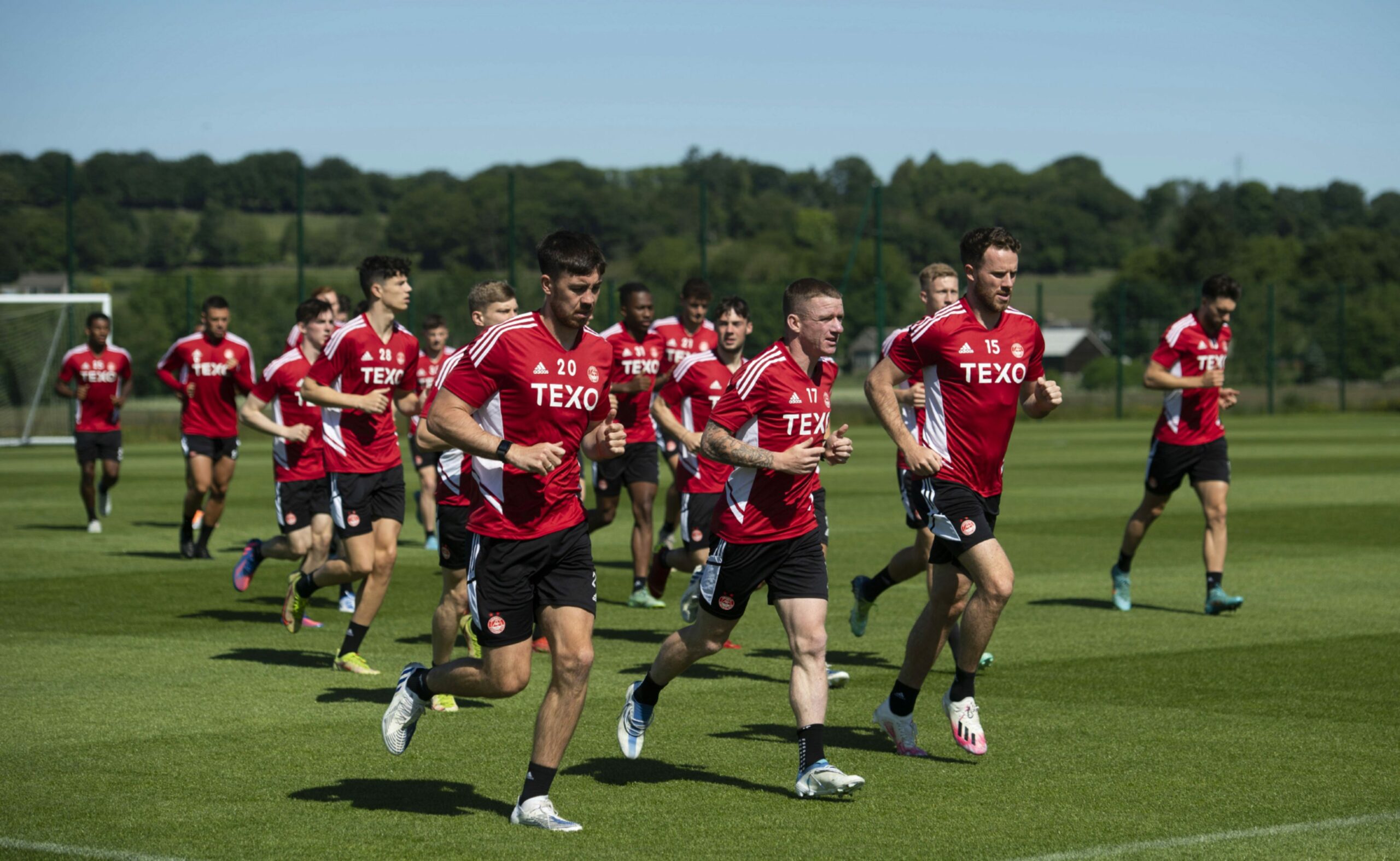 Declan Gallagher, Jonny Hayes and Marley Watkins during training.