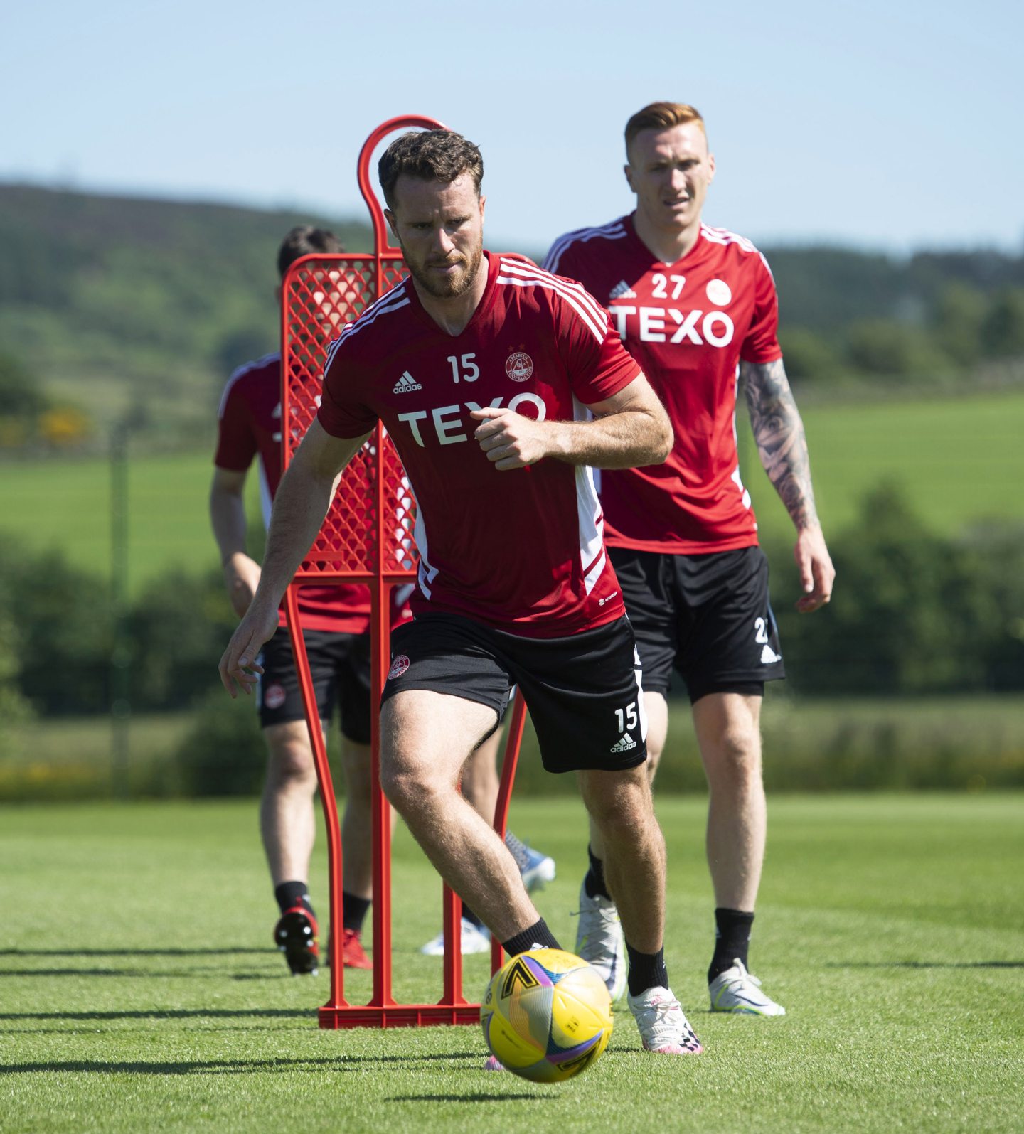 Marley Watkins dribbles with the ball during a pre-season training session.