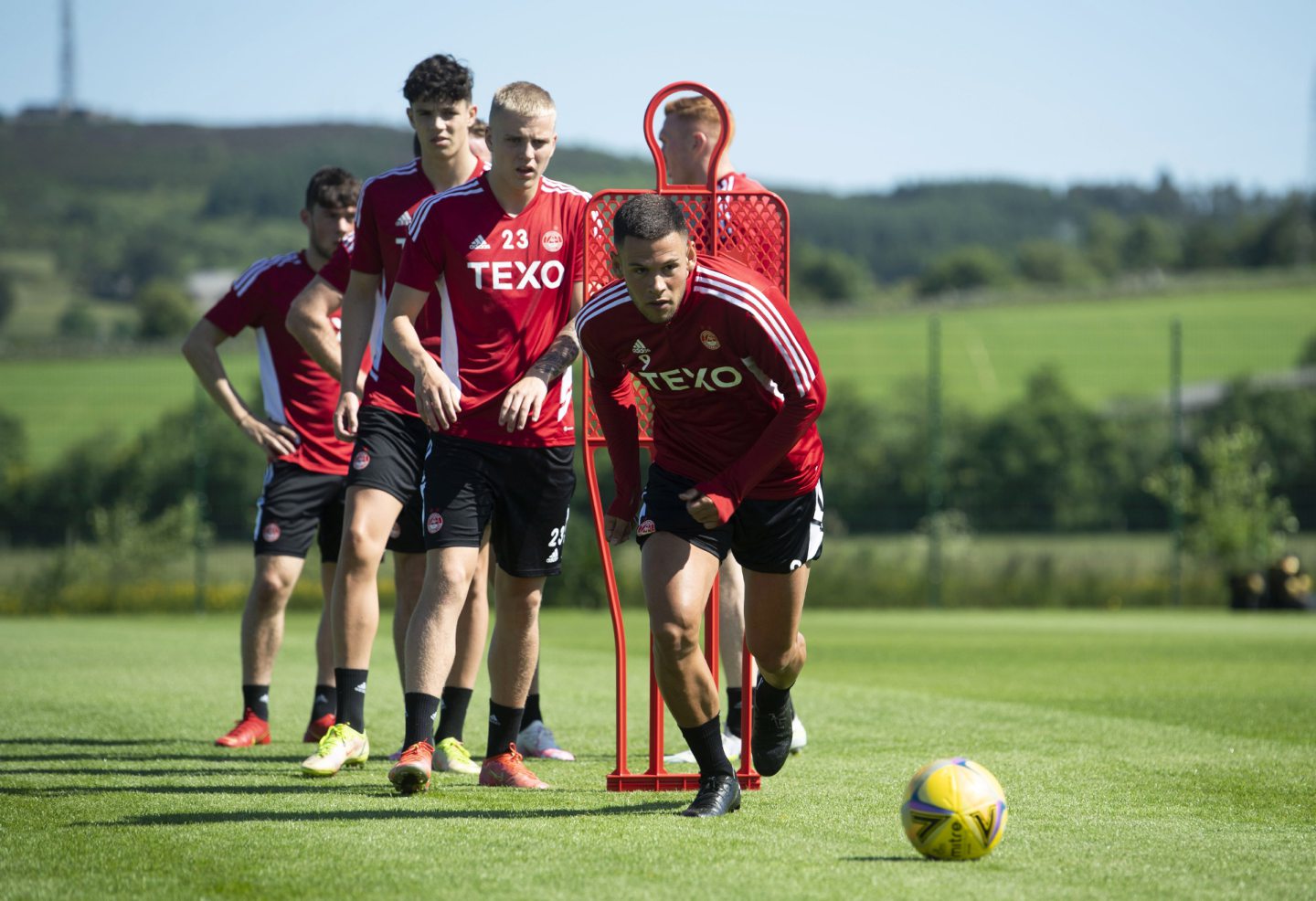 Aberdeen striker Christian Ramirez leads the way during a pre-season training session.