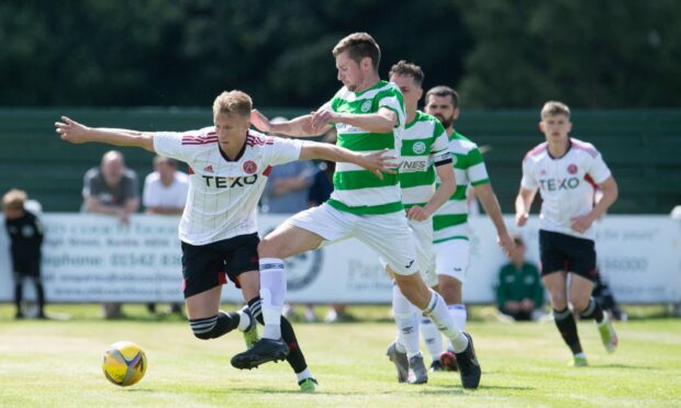 Aberdeen's Ross McRorie against Buckie Thistle's Mark McLauchlan during a pre-season friendly.