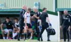 Aberdeen's Jack Mackenzie goes off injured during a pre-season friendly against Buckie Thistle.