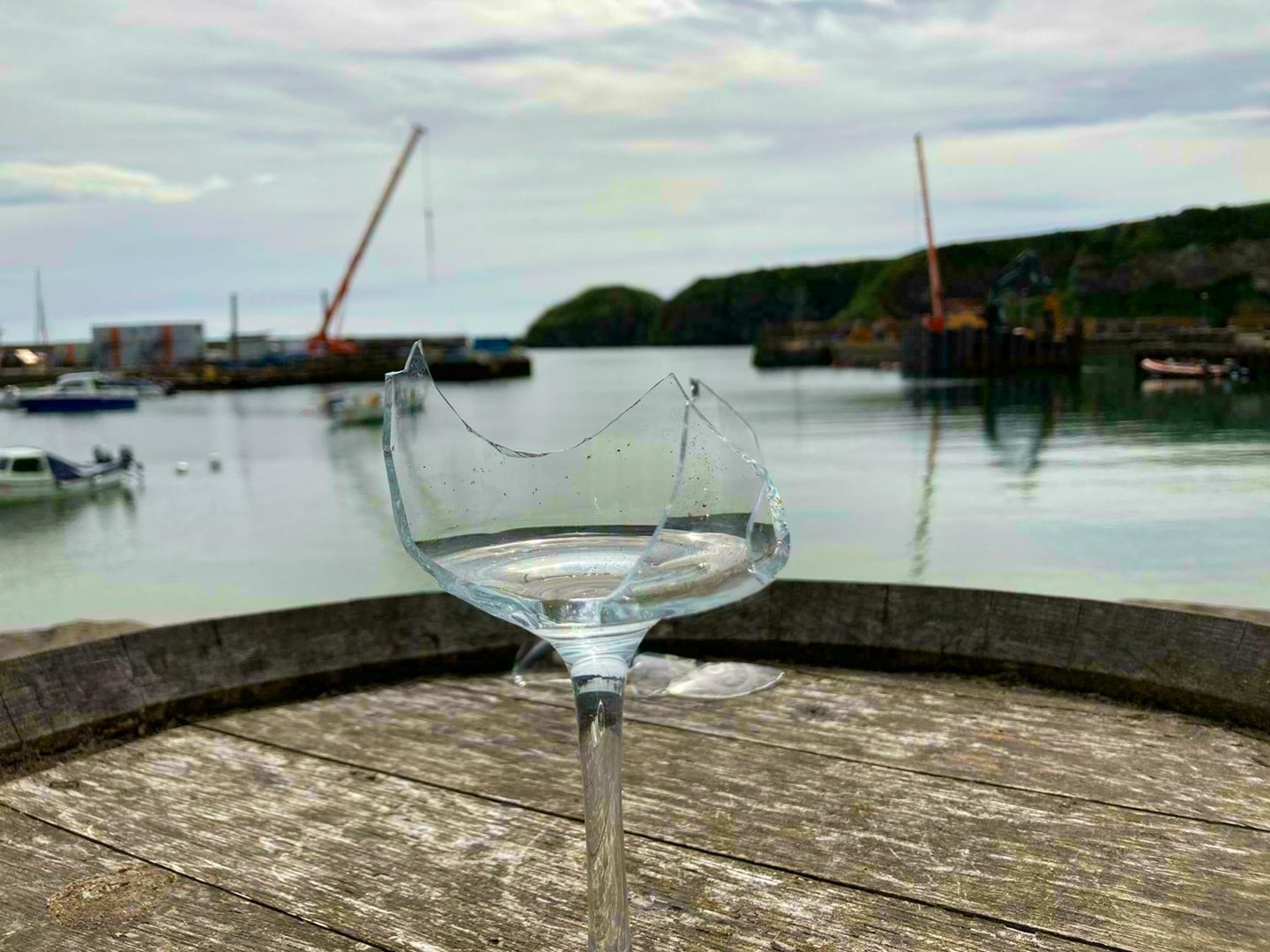 A glass broken after a gull knocked it from a table at Stonehaven harbour