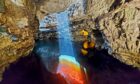 Kevin Bowie a tour guide took a picture of a shaft of rainbow coloured sunlight in Smoo Cave. Picture supplied by Kevin Bowie.