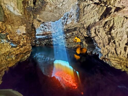 Kevin Bowie a tour guide took a picture of a shaft of rainbow coloured sunlight in Smoo Cave. Picture supplied by Kevin Bowie.