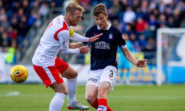 Paul Dixon, right, in action for Falkirk