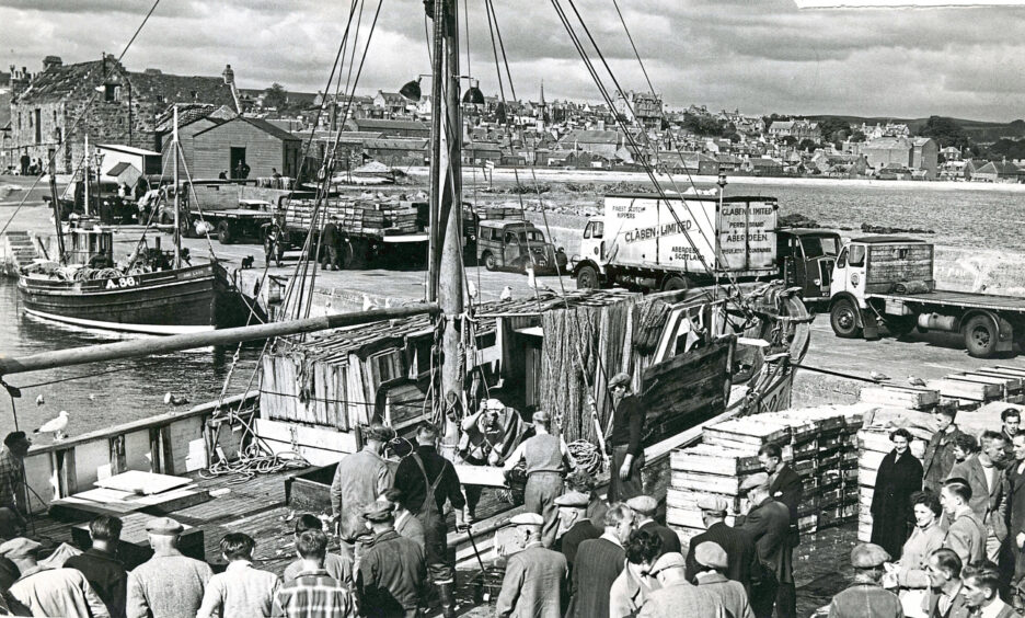 A Swedish vessel lands fish at Stonehaven harbour during a strike by Aberdeen trawlermen in 1955