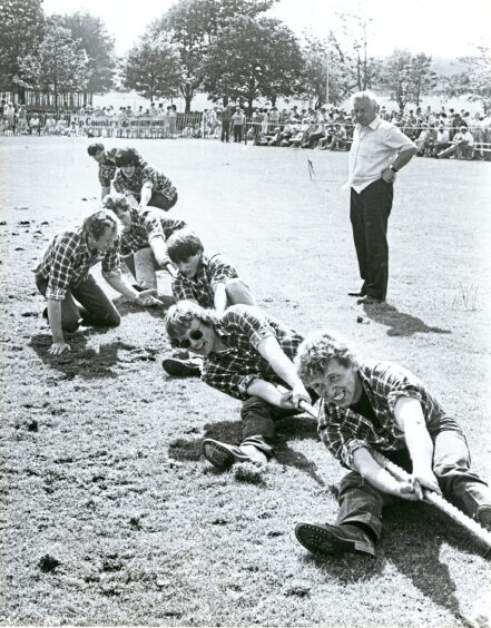  Coach Bill Meston urging on the Kinneff Young Farmers tug o’ war team at the Aberdeen Highland Games in 1986
