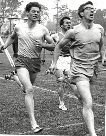 Men finishing the 88 yards race at the Aberdeen Highland games in 1964