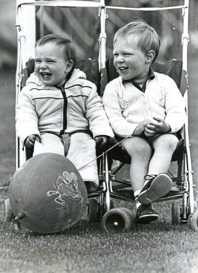 Andrew Macdonald and his brother Callum enjoy the Aberdeen Highland Games in 1985