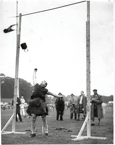 Arthur Rowe throws a 56lb weight over a record 15ft 11in height at the Aberdeen Highland Games in 1963