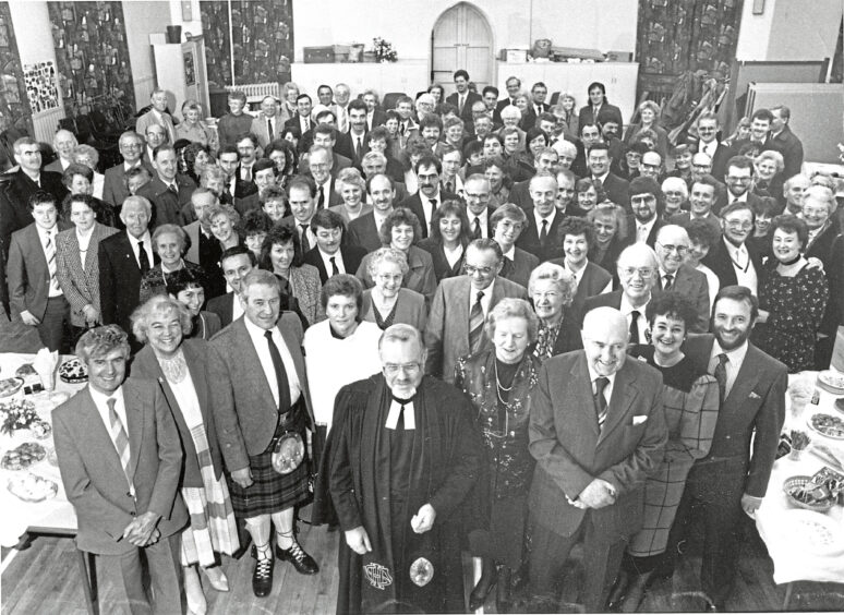 The Rev John Anderson (centre), of Mannofield Parish Church, Aberdeen, pictured with those who attended a special thanksgiving service for couples wed over the past 50 years at the church. Among the 140 people at the service were the longest married, Mr James and Mrs Isobel Stewart, of Mannofield Road who were married in August 1937, and Dorothy and Keith Farquharson, who wed as recently as December.