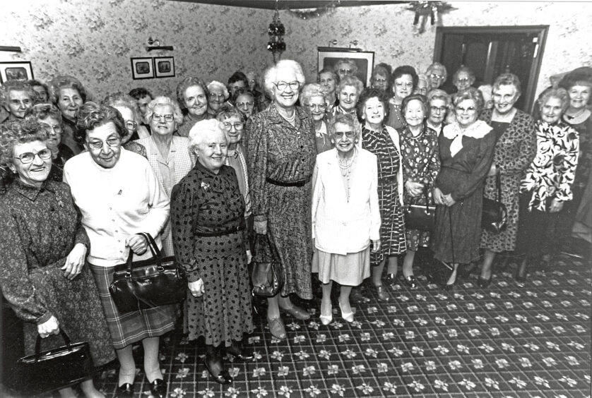 Senior members of Mannofield Church Fellowship before their 1989 Christmas lunch at the Amatola Hotel. Standing centre foreground are Dorothy Campbell, president, and Vera Hildew, treasurer.