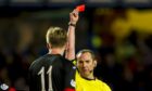 The March 2022 Football Distress Survey found that two fewer Scottish clubs were facing financial difficulty than six months ago. Picture features referee Stevie O'Reilly hoisting a red card in a 2013 match.