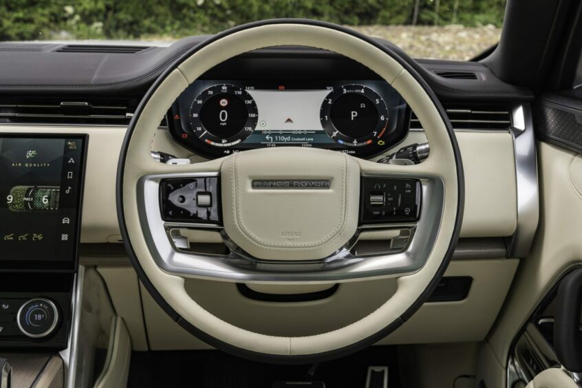 The steering wheel and dials of the new Range Rover.