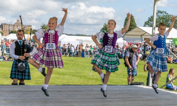 The Aboyne Highland dress is the standard for dancers since its introduction in the 1950s. Supplied by Moyra Gray.