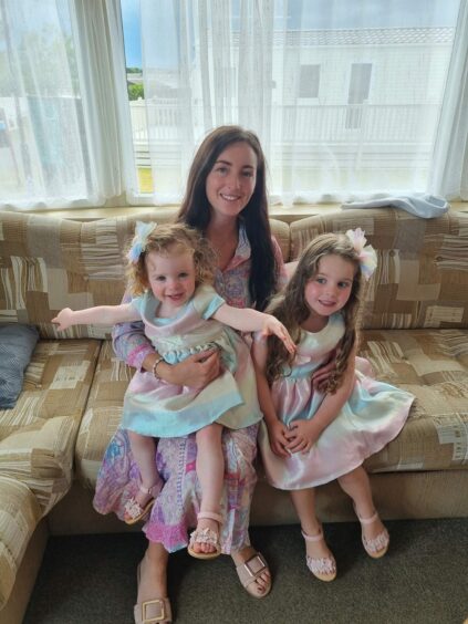 Arlene with her daughters Talia and Aspen.