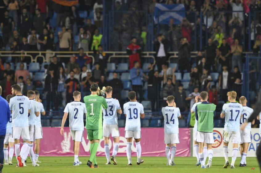 Scotland's players applaud their fans at the end of the Nations League match against Armenia.