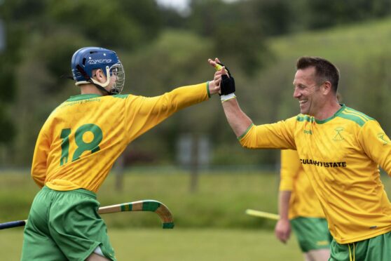 Glengarry No. 18 Jack West with player boss Scott Bremner.  Image: Neil Paterson