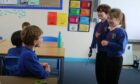 Banchory Devenick pupils Katie and Shamu, both 8, deliver a mindfulness session to their classmates.