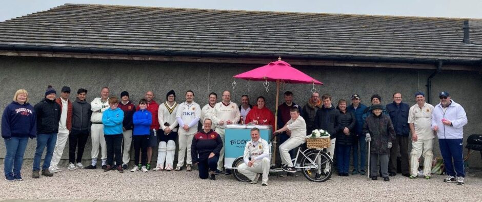 Fraserburgh Cricket Club president Michael Watson, second from right, with players and volunteers of the club.