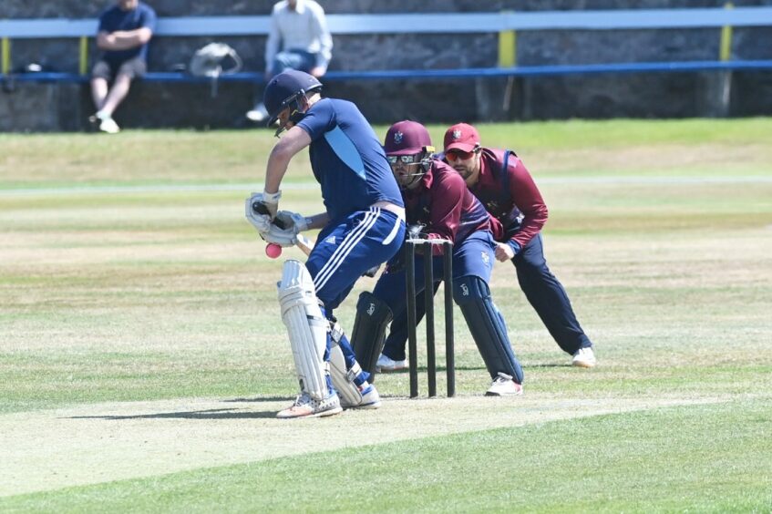 Aberdeenshire's Clark Cameron and Watsonians wicketkeeper Andrew Brock