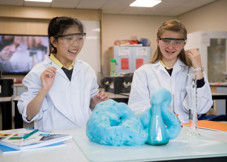 Young girls in a lab at St Margaret’s School for Girls - one independent school for children 