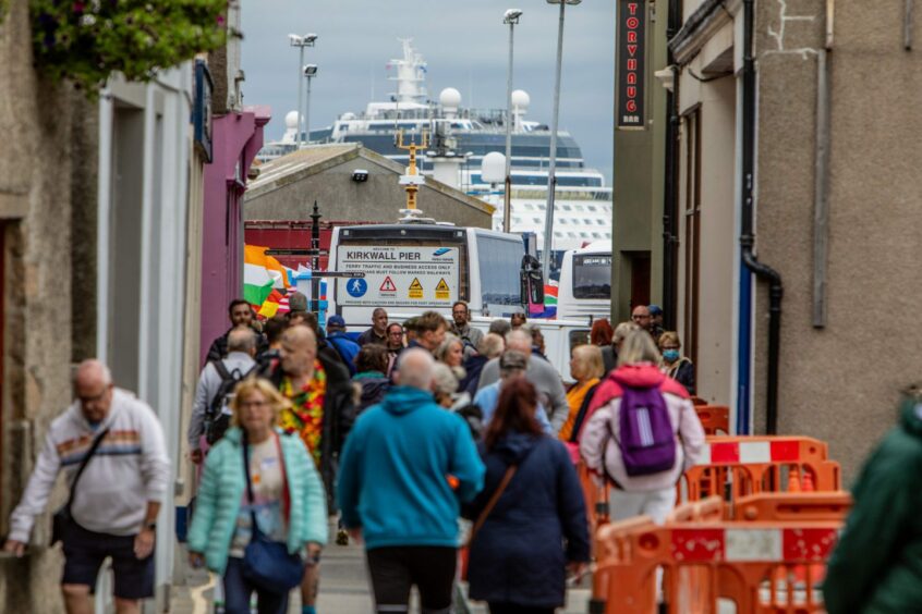 people walking on the streets on Orkney Islands 