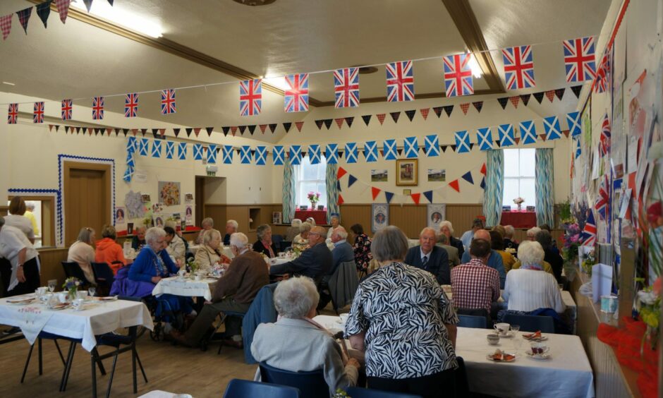 Busy dining hall during a previous royal celebration.