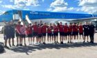 Aberdeen 2008's pose with the Flint Micasa Cup before boarding their flight home.