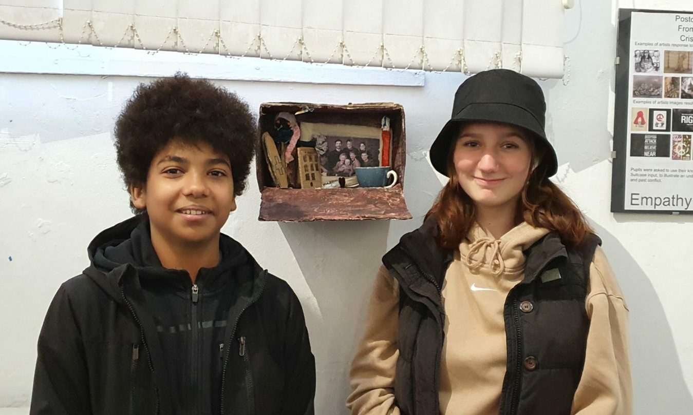 Harlaw Academy pupil Oliwia Borowski (right) showing her model of a suitcase to her friend Sammy Bucius-Balde.