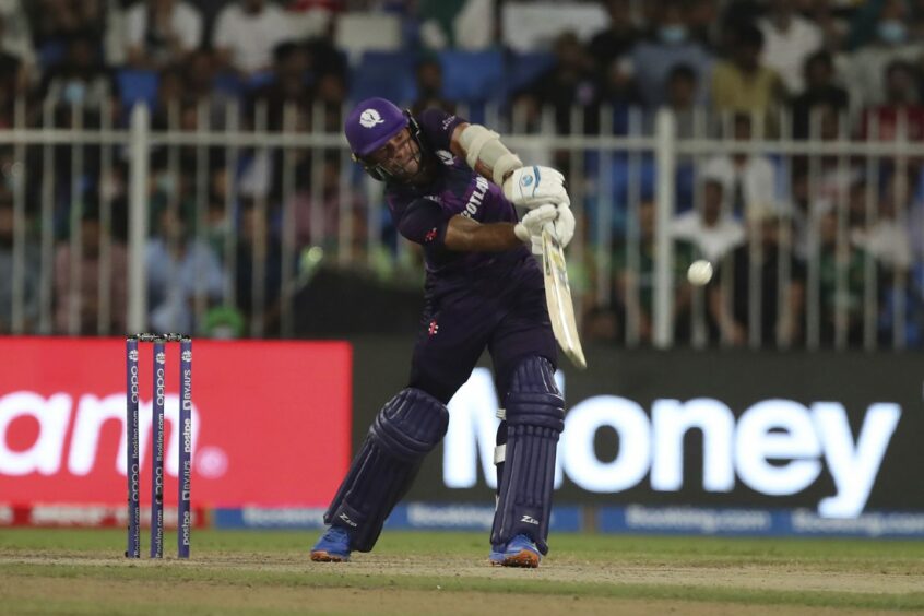 Scotland's captain Kyle Coetzer plays a shot during the Cricket Twenty20 World Cup match between Pakistan and Scotland in Sharjah, UAE, Sunday, Nov. 7, 2021. (AP Photo/Aijaz Rahi)