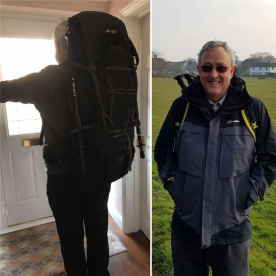David Wightman in a jacket and rucksack.