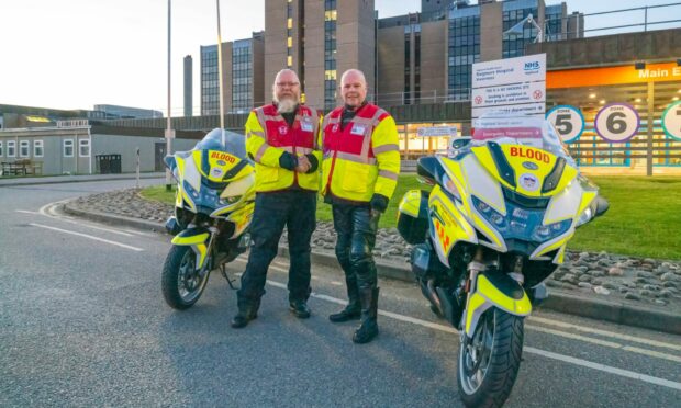 Thomas Carroll and Mark Robinson from Highland and Islands Blood Bikes (HAIBB) set off from Raigmore Hospital on Thursday morning on a mammoth 1,700-mile journey. Picture by Brian Smith.