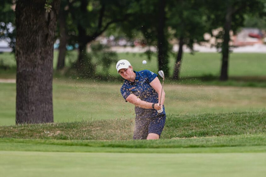 Hannah McCook playing golf