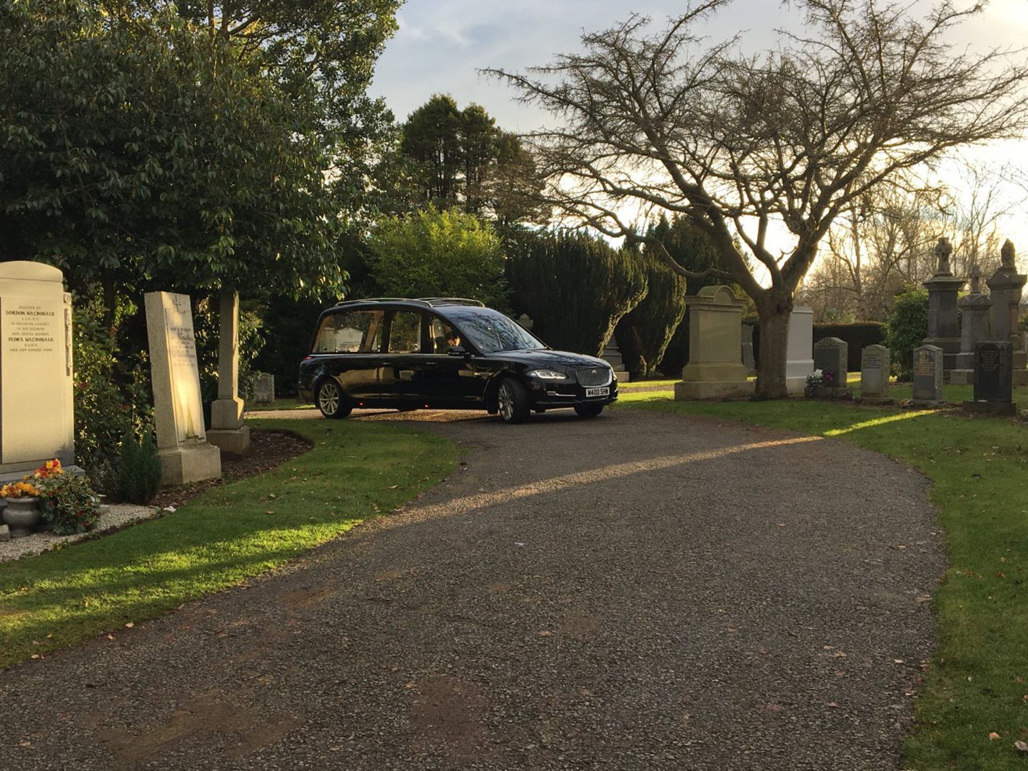 hearse arriving at cemetery