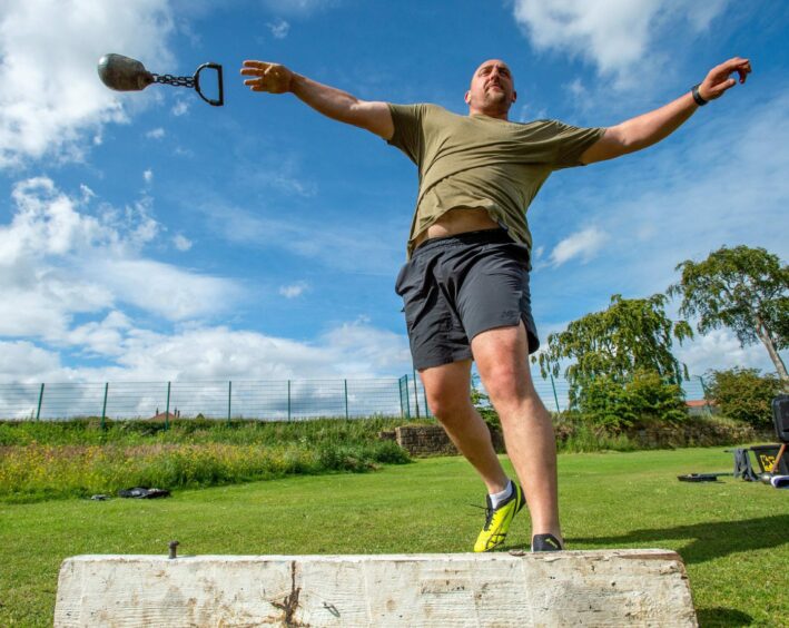 Mr Randalls practicing throwing techniques.