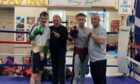 After Thursday's eight-round sparring session are Calum Turnbull, head coach Laurie Redfern, George Stewart and his dad Bruno Stewart, who also coaches at the club.