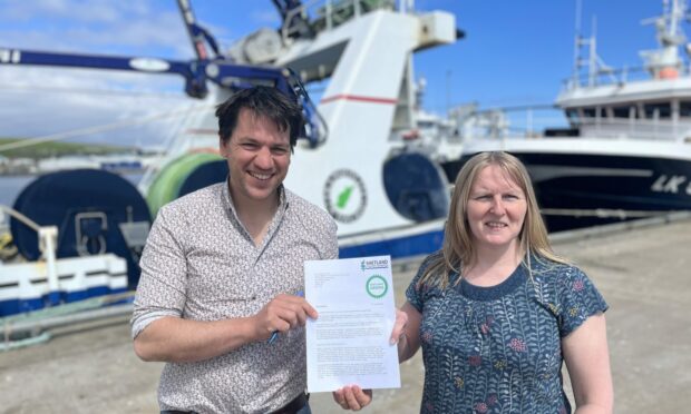 Alex Armitage, of Shetland Greens, and Sheila Keith, of Shetland Fishermen's Association, with their joint letter to the cabinet secretary.
